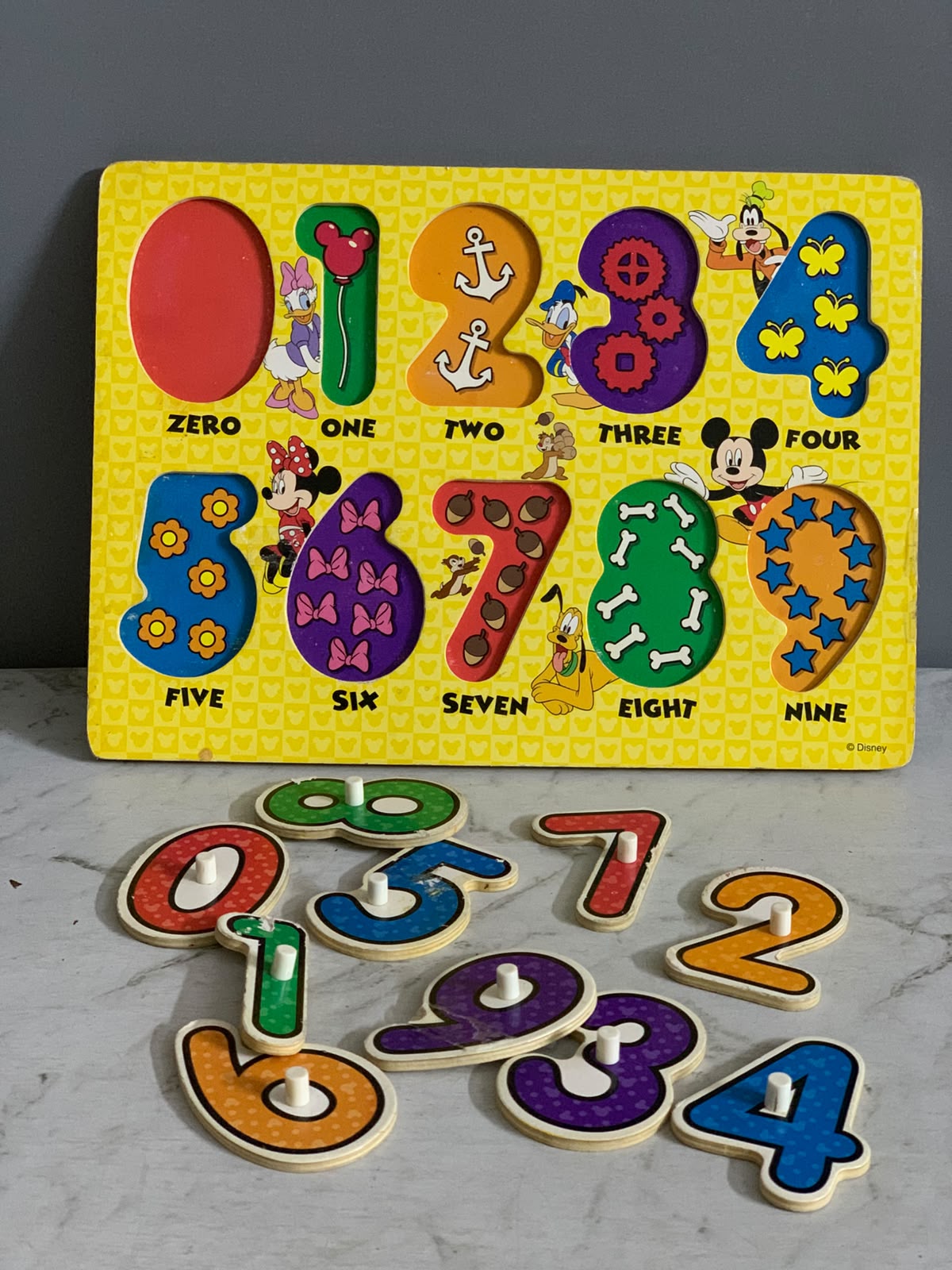 Melissa & Doug Disney Mickey Mouse Numbers Wooden Peg Puzzle.