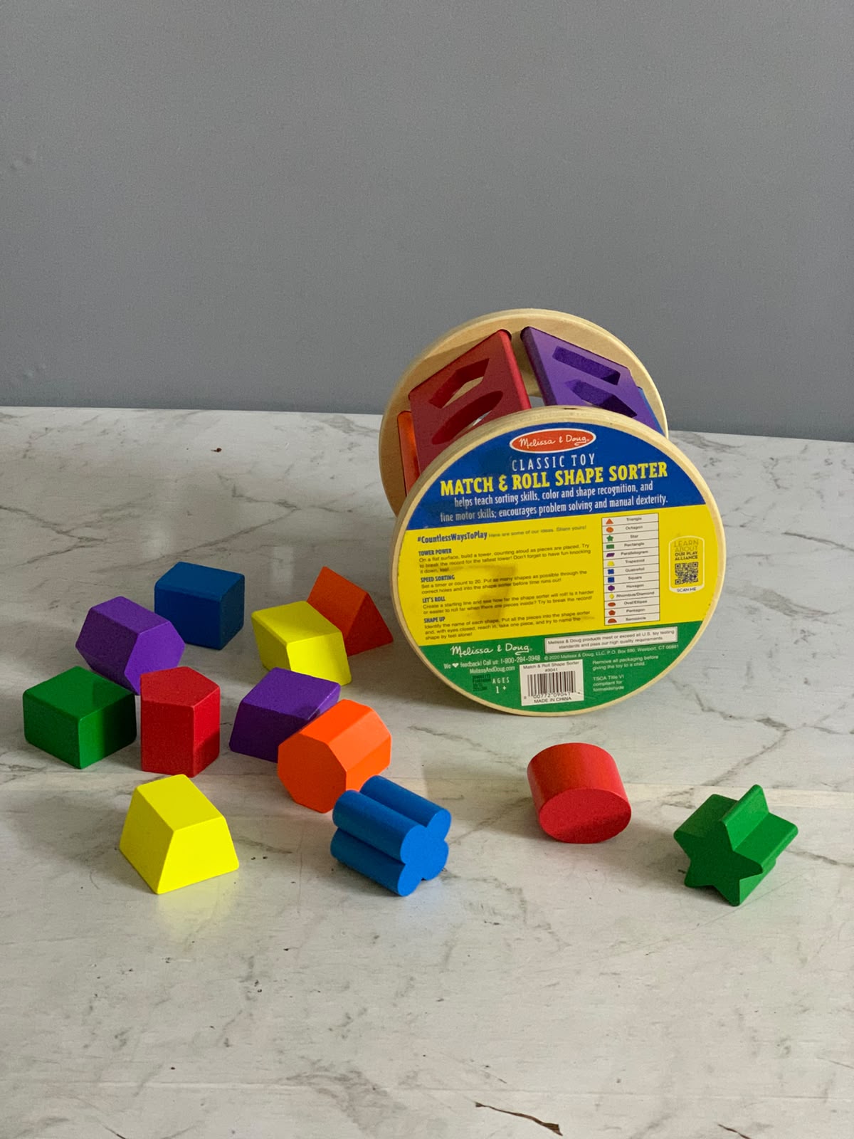 Melissa & Doug Match and Roll Shape Sorter.