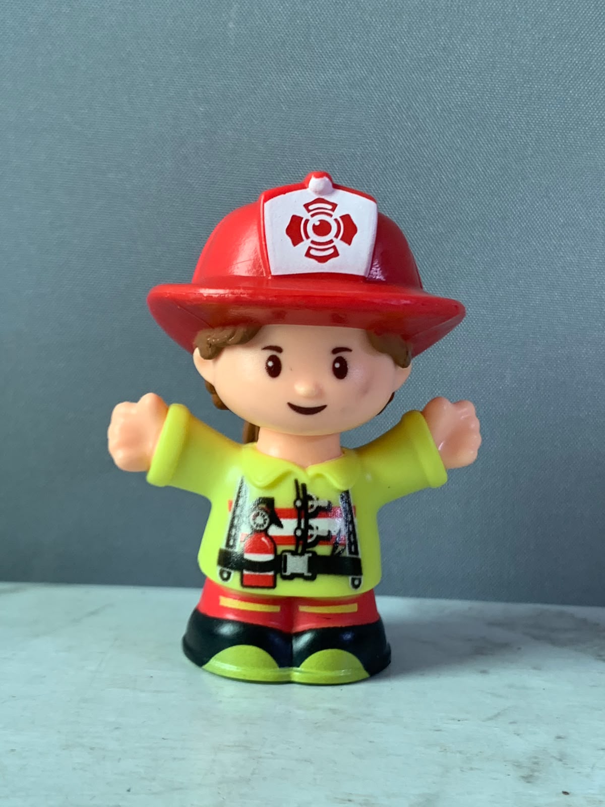 Fisher-Price Little People Firefighter Figure.