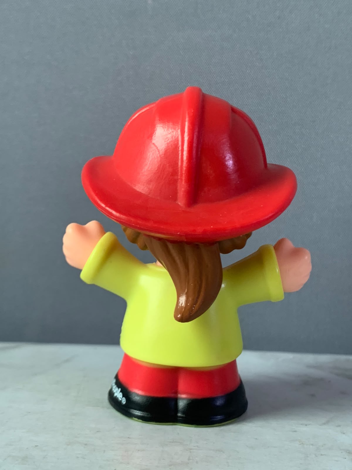 Fisher-Price Little People Firefighter Figure.