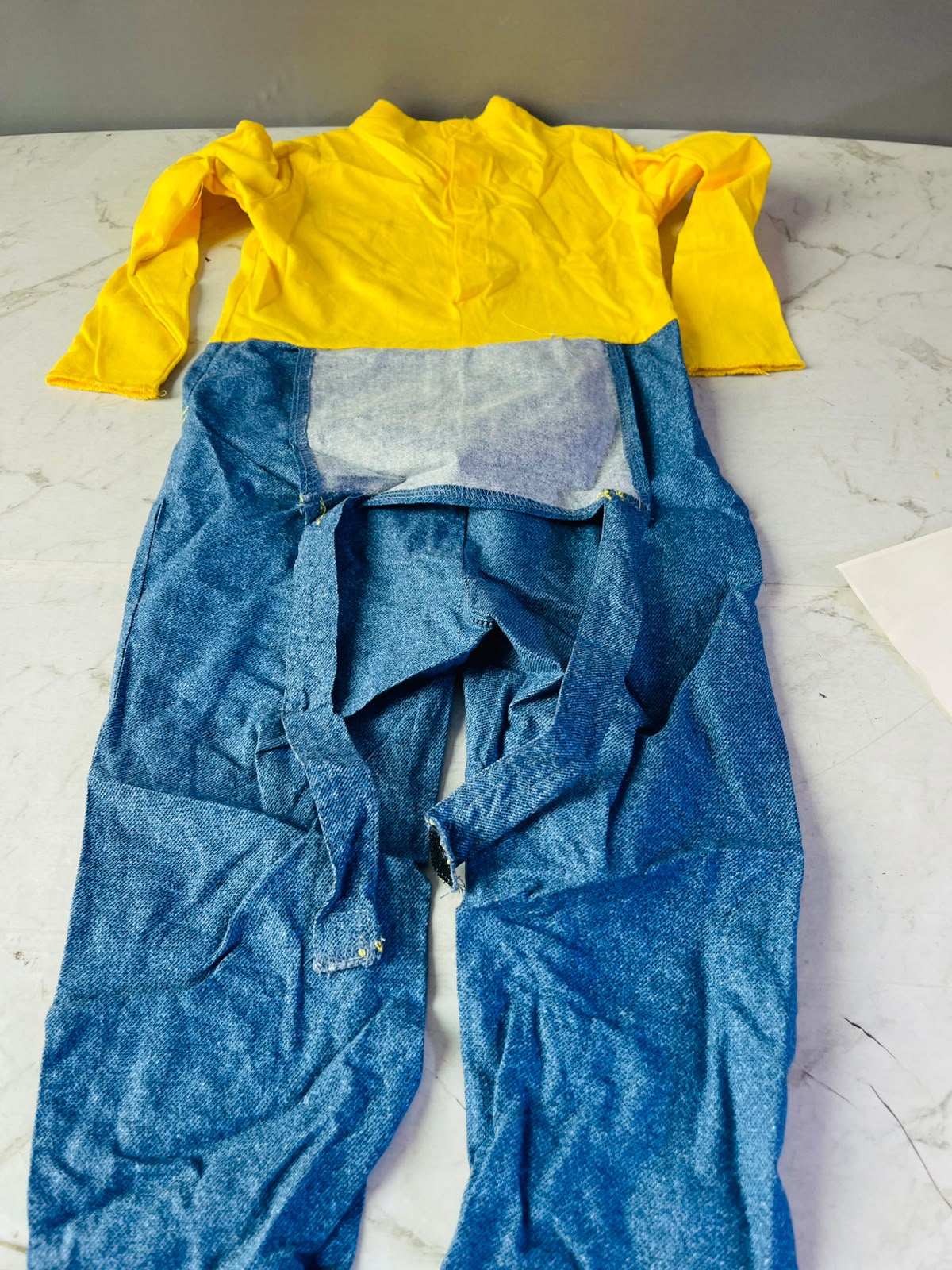 Minion Character Jumpsuit. (Rs 300 advance)