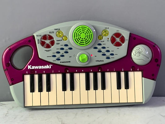 Kawasaki Child's Electronic Toy Keyboard. (Batteries cover is missing) (Rs 300 advance)