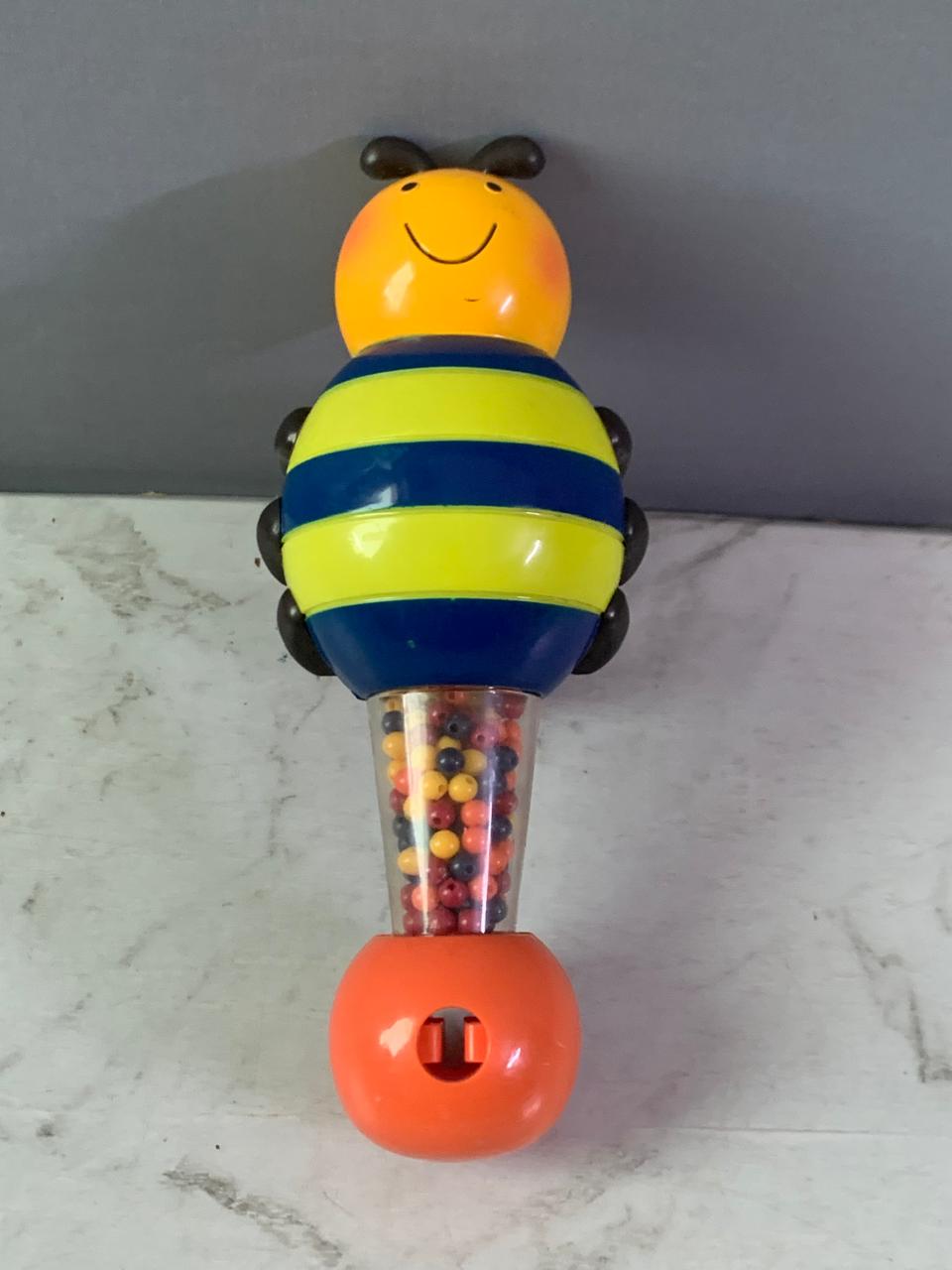 B. Toys Parum Pum Pum Bee Maraca Shaker.