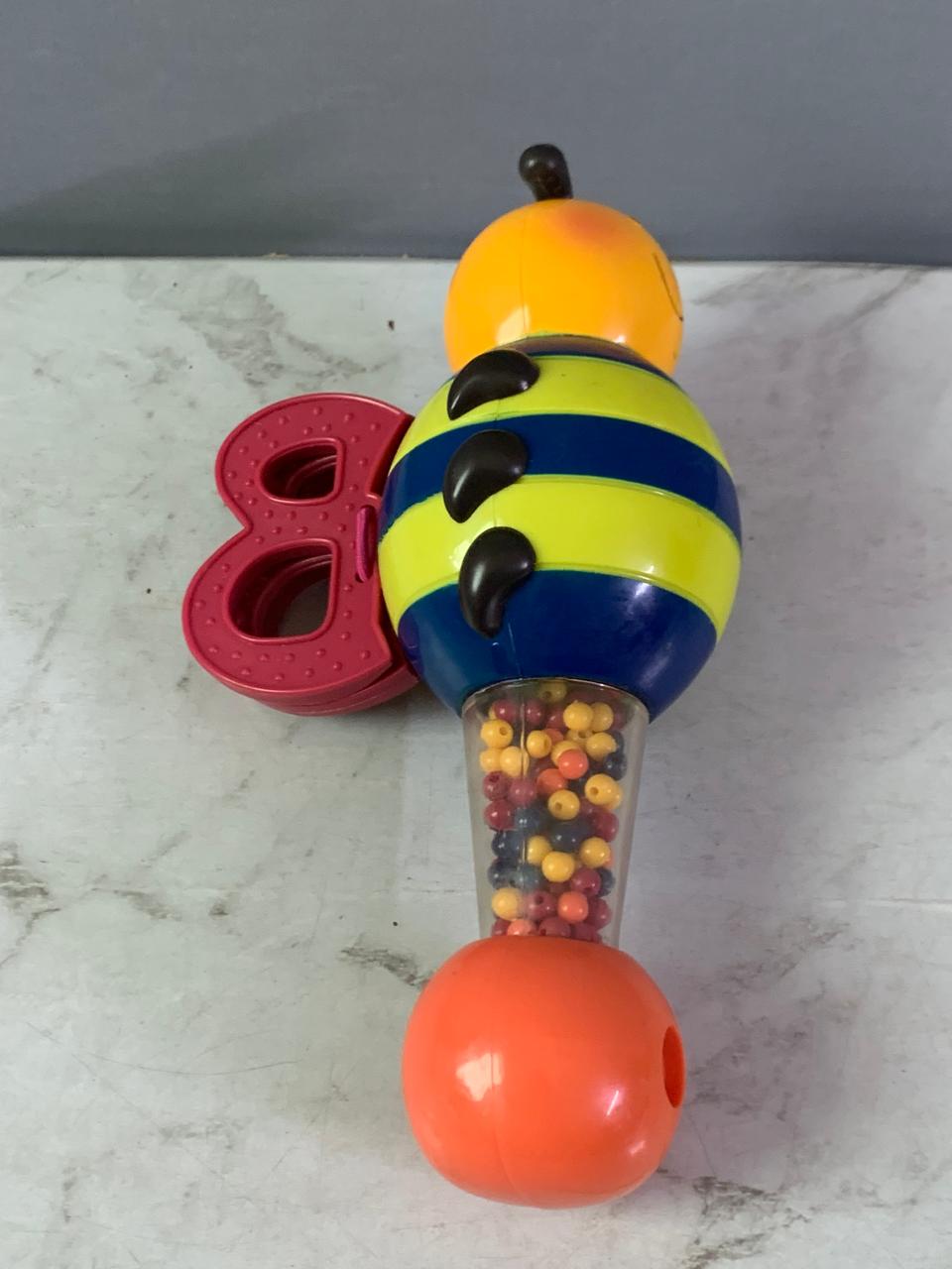 B. Toys Parum Pum Pum Bee Maraca Shaker.
