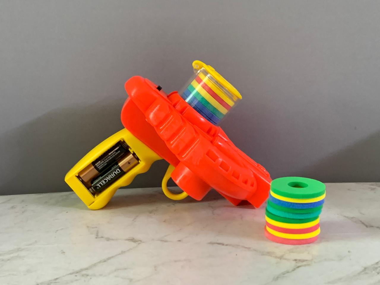 Foam Disc Shooter Toy with 20 Discs. (batteries cover missing)(Rs 250 advance)
