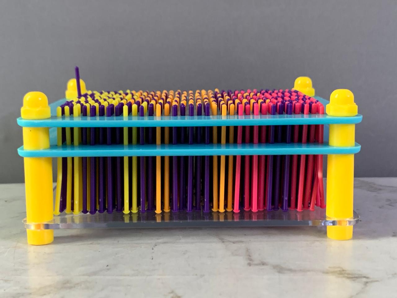 Colorful 3D Plastic Pin Art Board Toy.(minor crack)