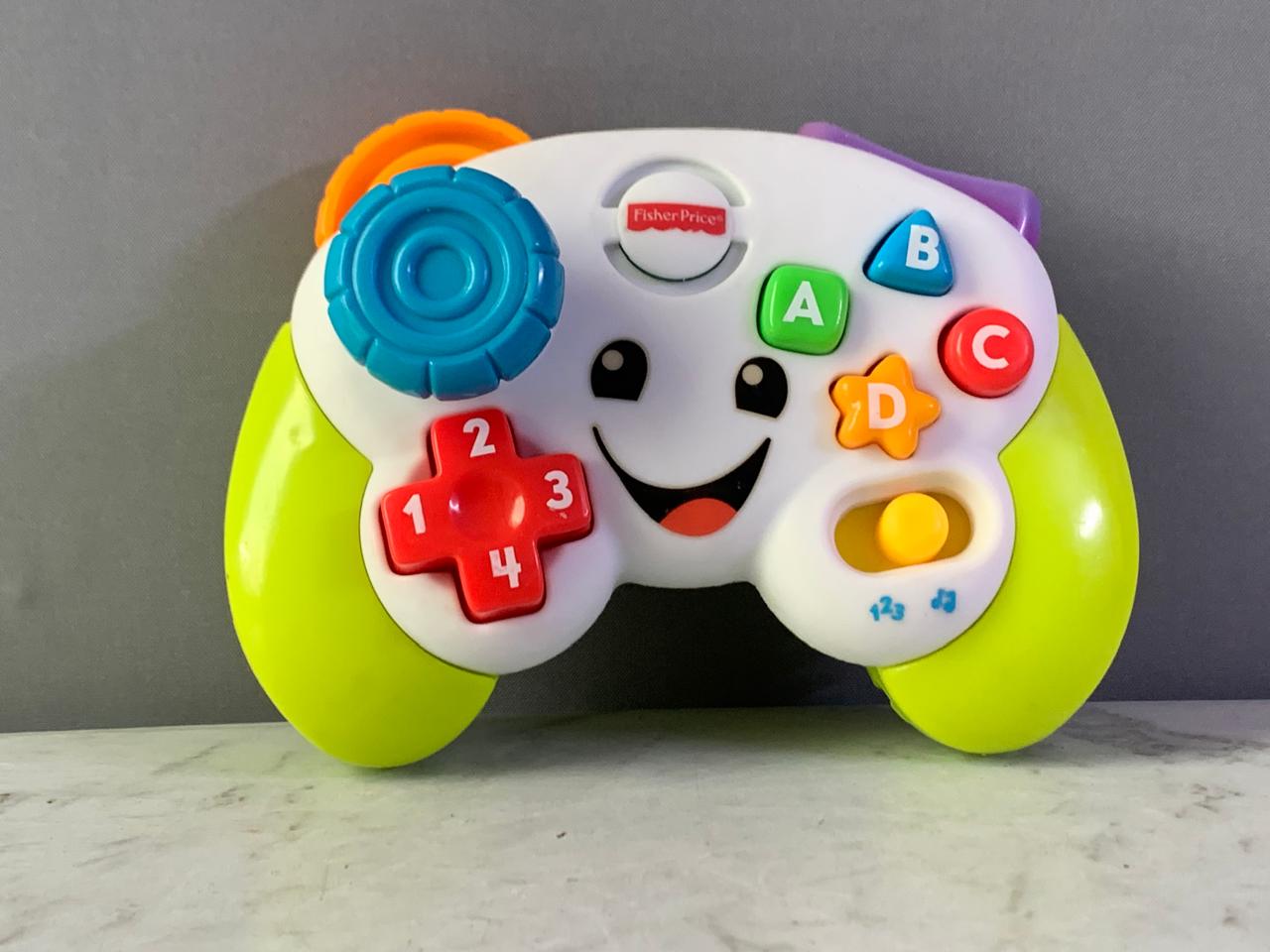 Fisher-Price Baby & Toddler Toy Laugh & Learn Game Controller.