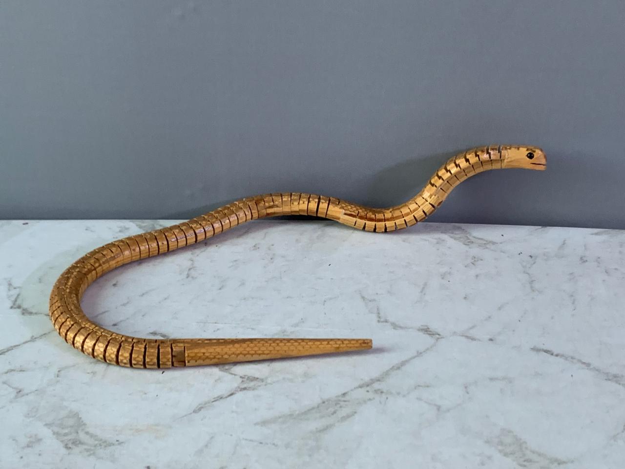 Jointed Wooden King Cobra Toy. (Rs 250 advance)