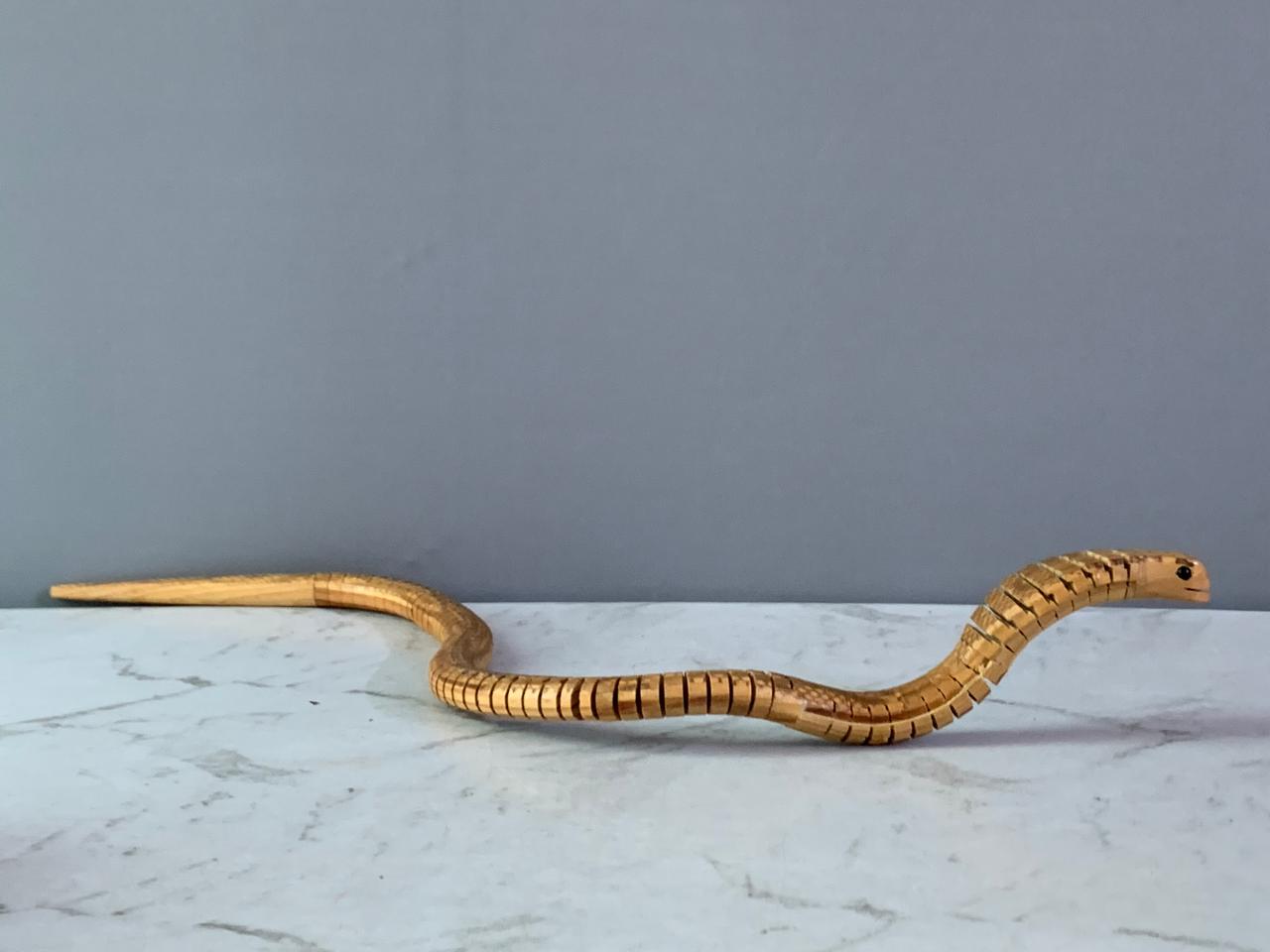 Jointed Wooden King Cobra Toy. (Rs 250 advance)
