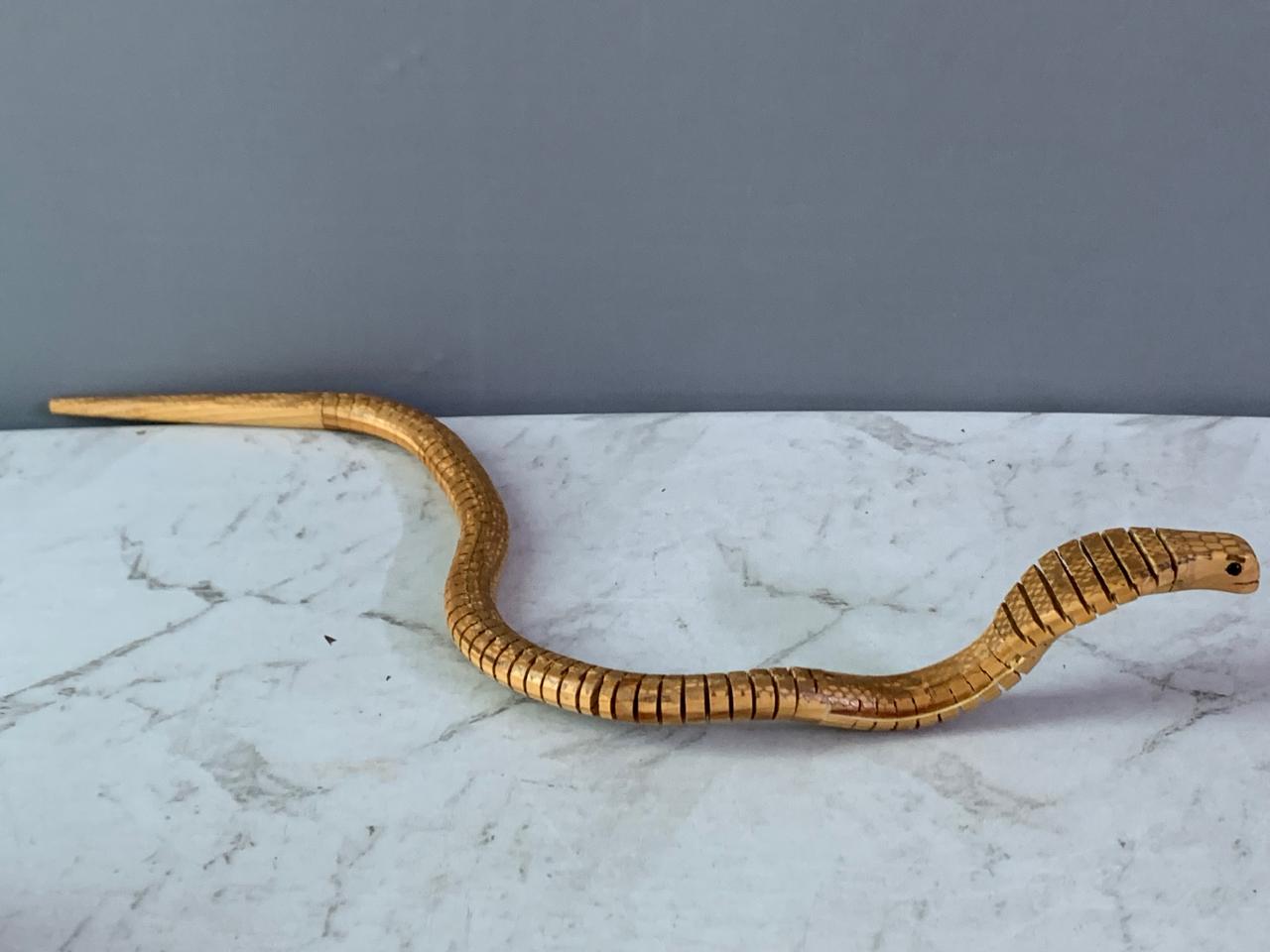 Jointed Wooden King Cobra Toy. (Rs 250 advance)