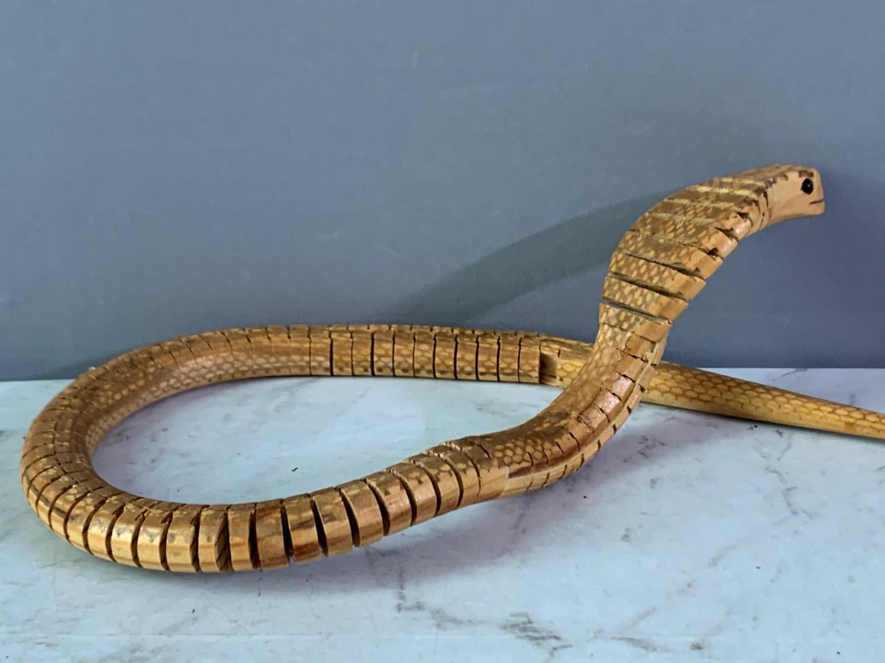 Jointed Wooden King Cobra Toy. (Rs 250 advance)