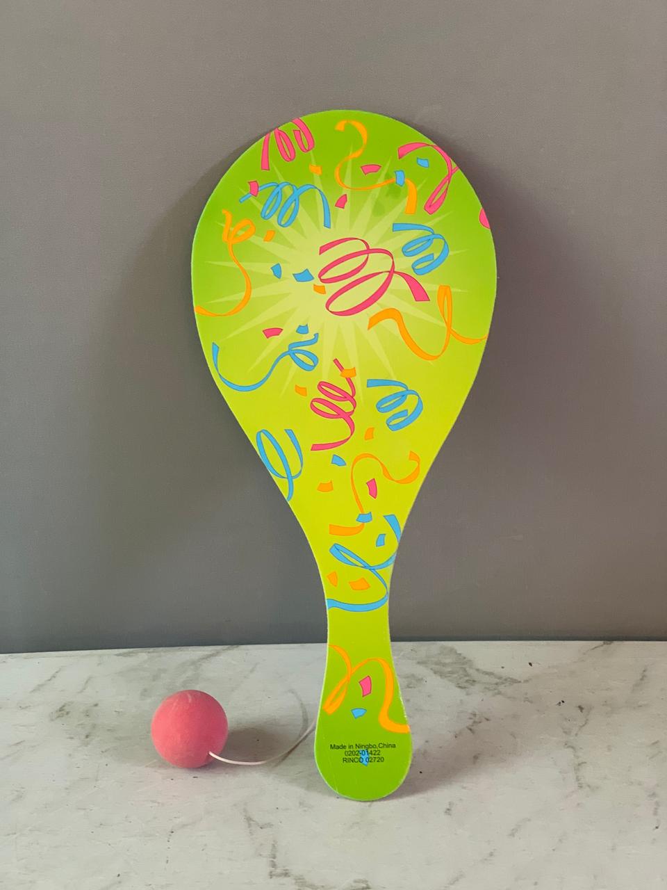Neon Paddle Ball Game.