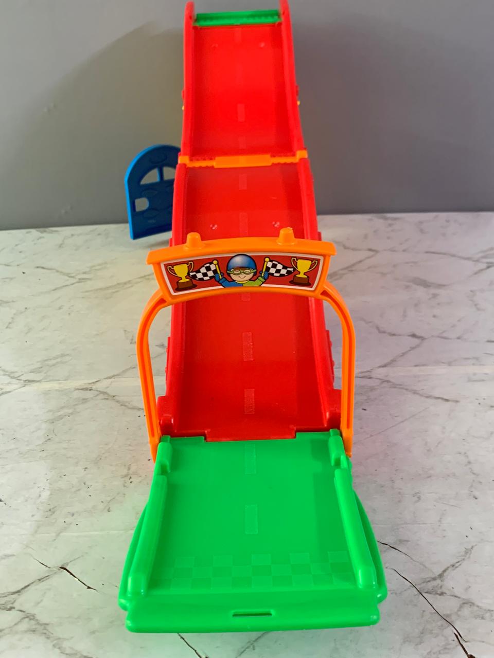 Fisher-Price Little People Wheelies Rev 'n Sounds Race Track.( without vehicles)(Rs 350 advance)