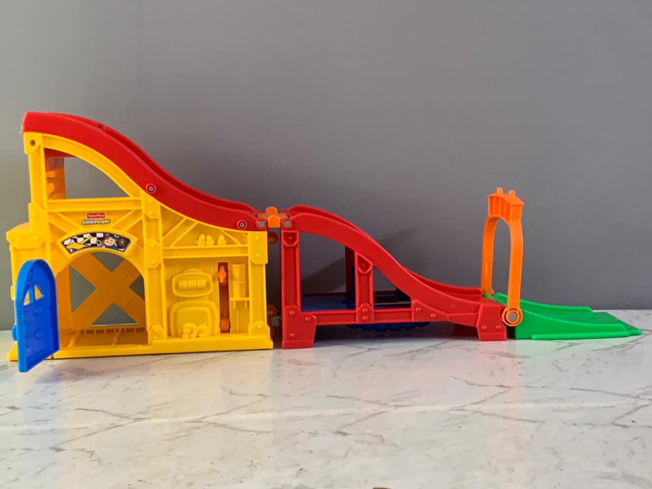 Fisher-Price Little People Wheelies Rev 'n Sounds Race Track.( without vehicles)(Rs 350 advance)
