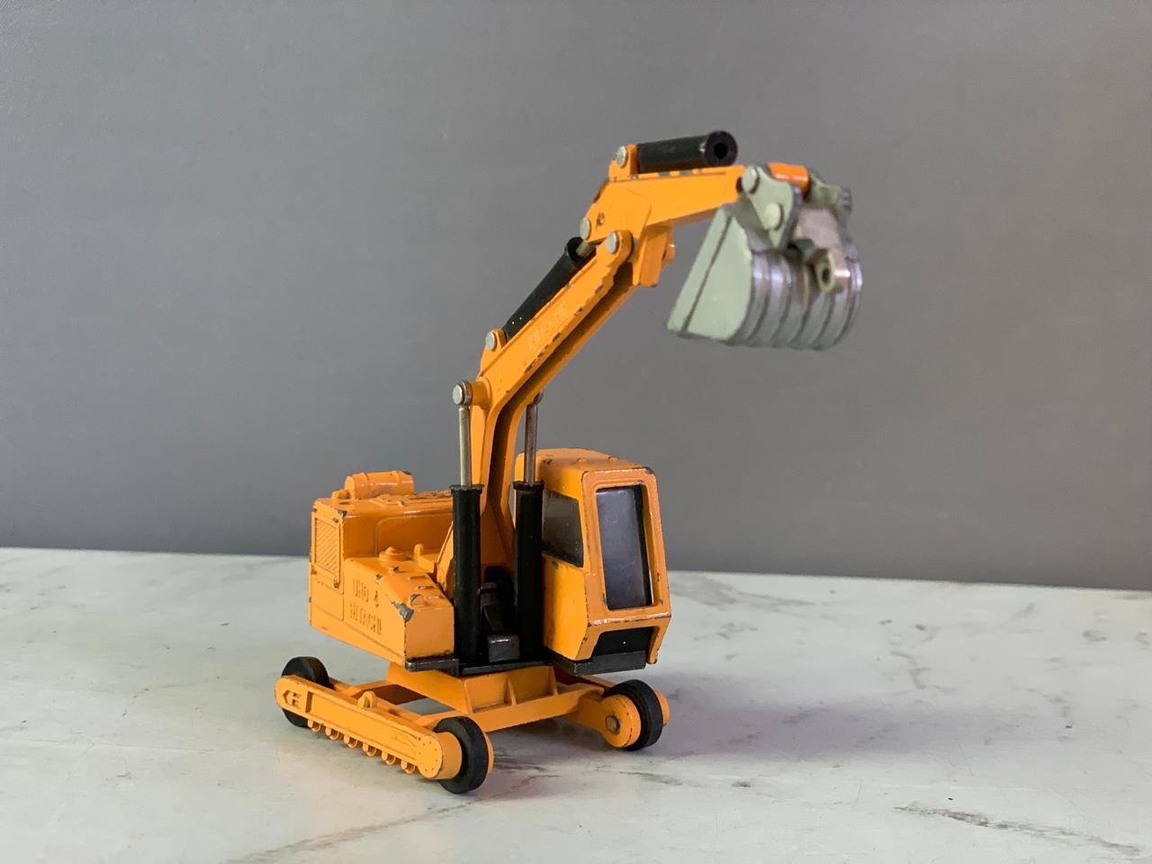 Shinsei Mini Power Hitachi UH04 Excavator Die-Cast Toy.