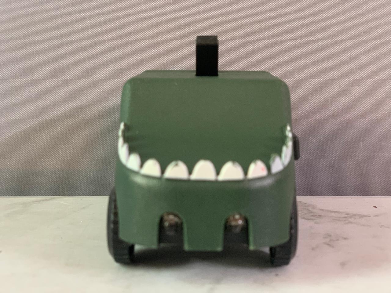 Dino Transform Spin Car. (Rs 250 advance)