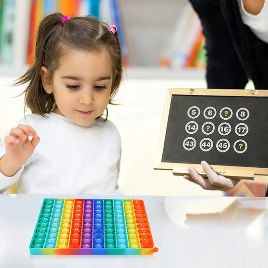 Rainbow Square Dimples Fidget Toy. (Rs 200 advance)