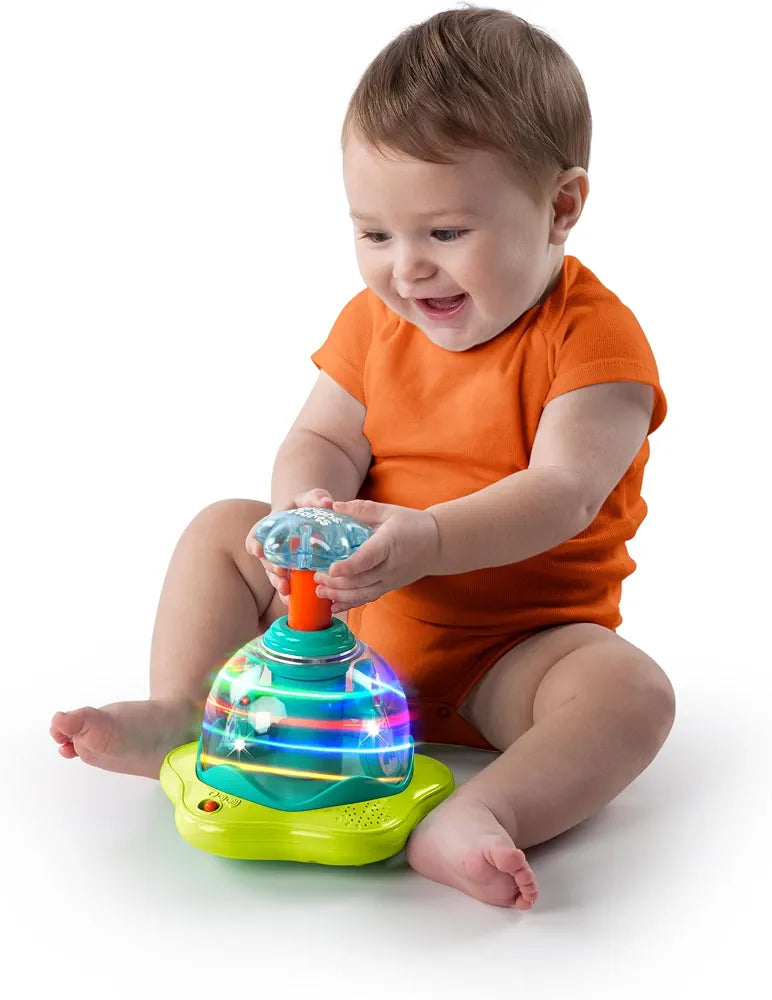 Bright Starts Press and Glow Spinner Cause and Effect Musical Baby Toy.(batteries cover missing)(Rs 250 advance)