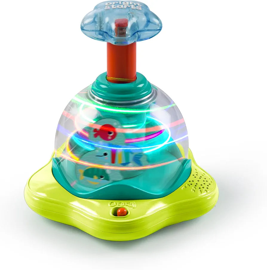Bright Starts Press and Glow Spinner Cause and Effect Musical Baby Toy.(batteries cover missing)(Rs 250 advance)
