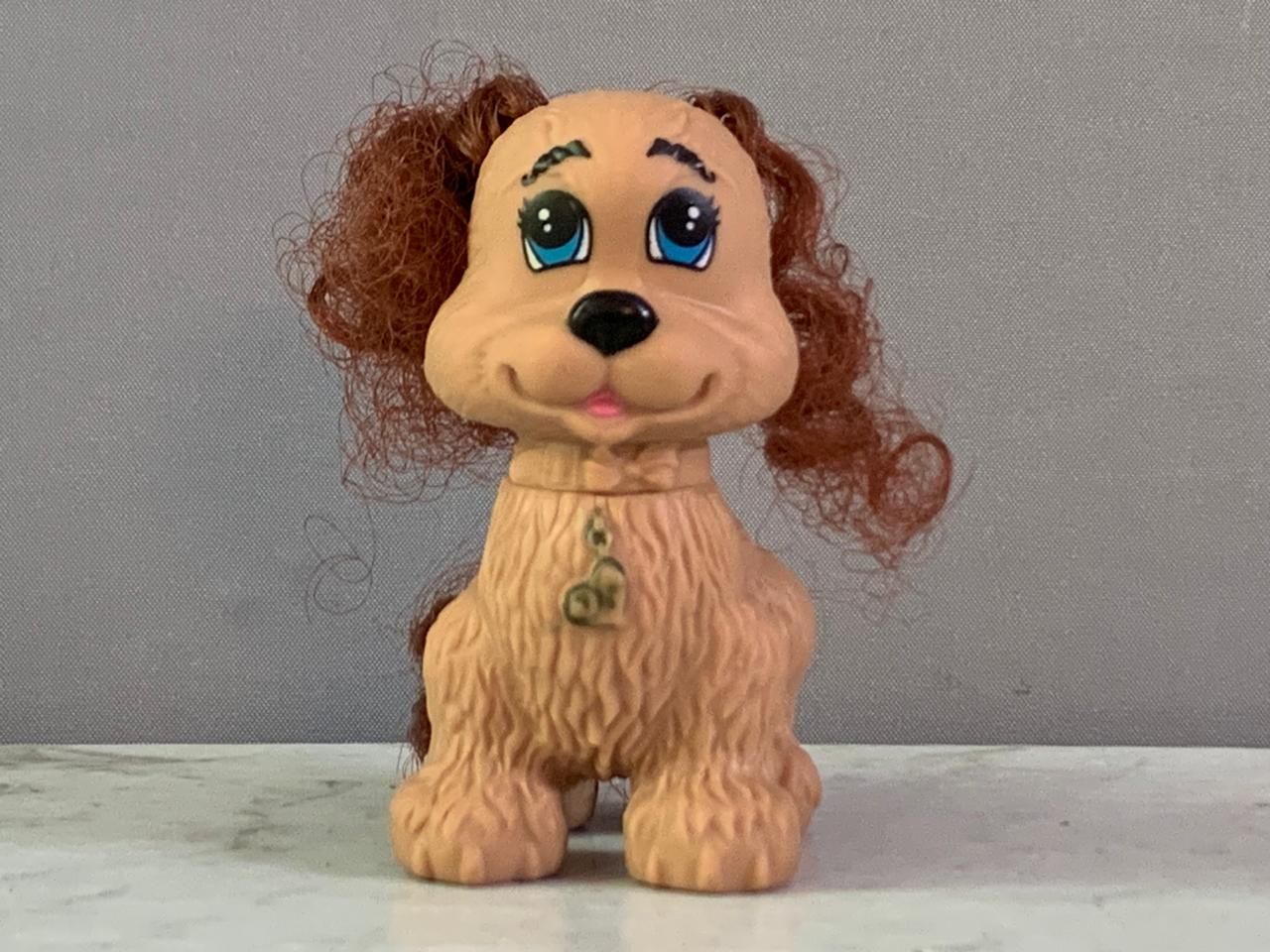 Fisher-Price Snap 'N Style Pets Coco the Cocker Toy Figure.