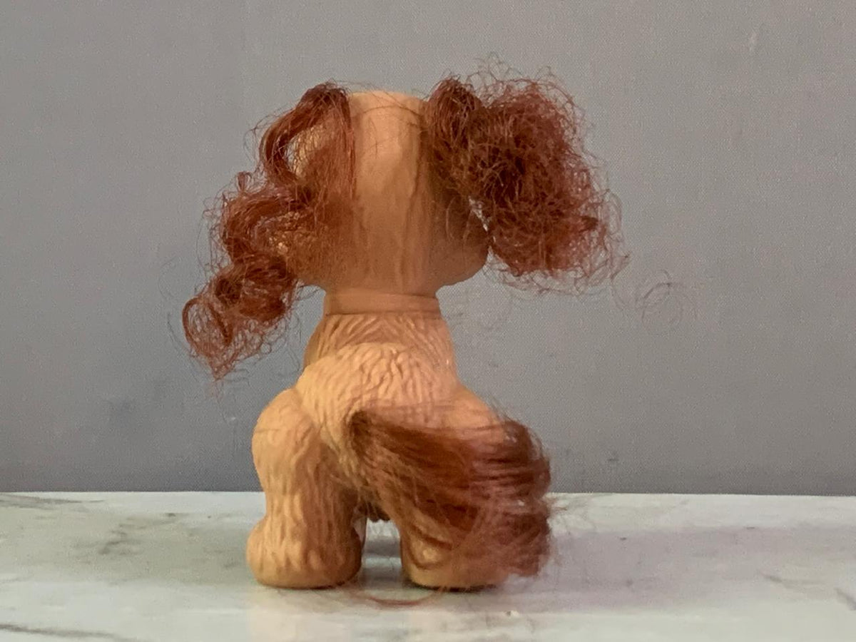 Fisher-Price Snap 'N Style Pets Coco the Cocker Toy Figure.