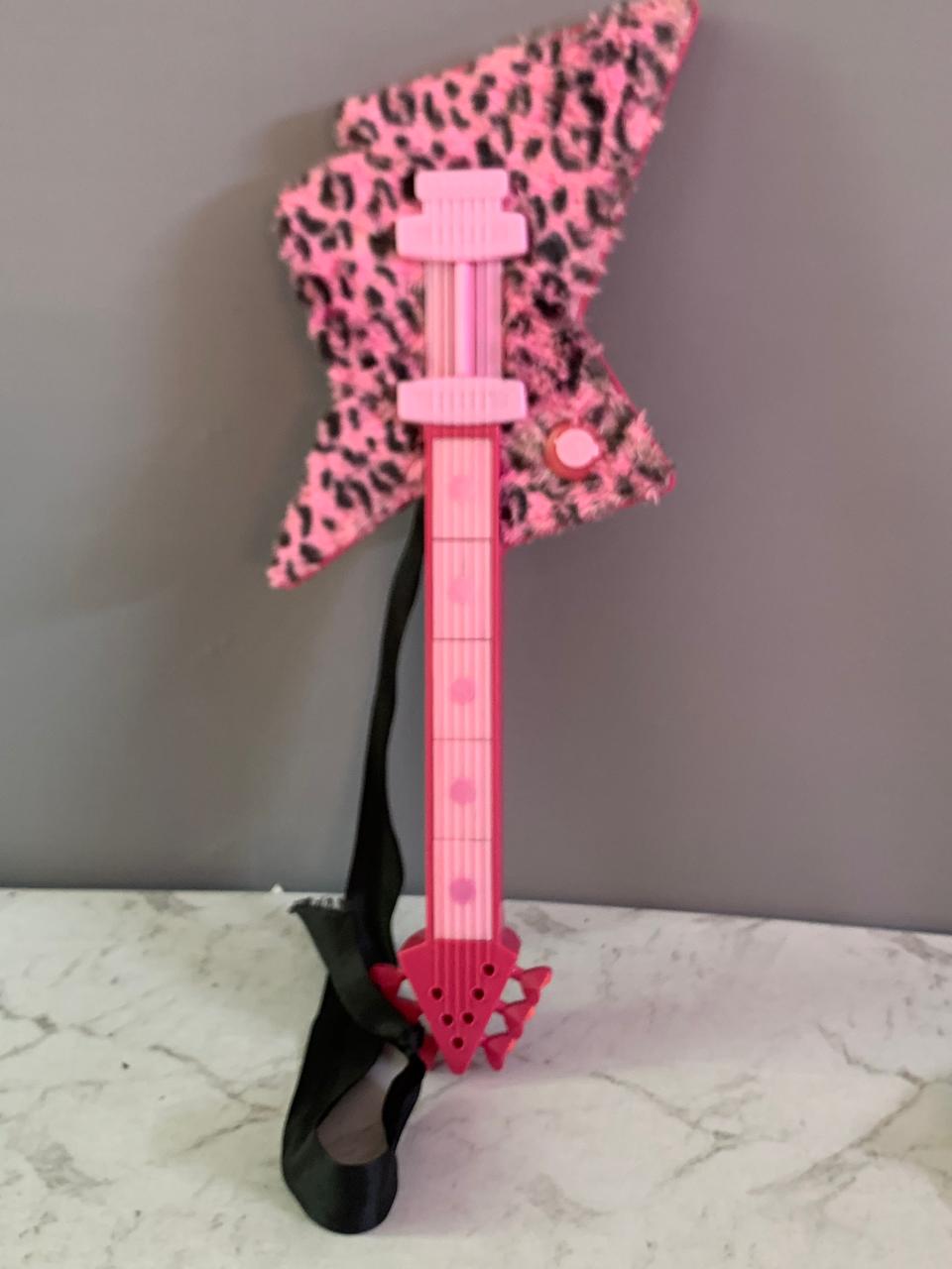 Trolls DreamWorks World Tour Poppy's Rock Guitar.(Rs 500 advance)