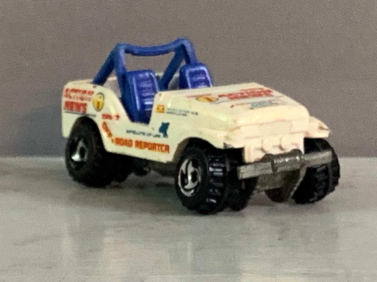 Hot Wheels "Action News" Off-Road Reporter Jeep CJ-7.