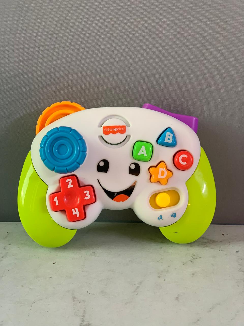 Fisher-Price Laugh & Learn Game & Learn Controller.