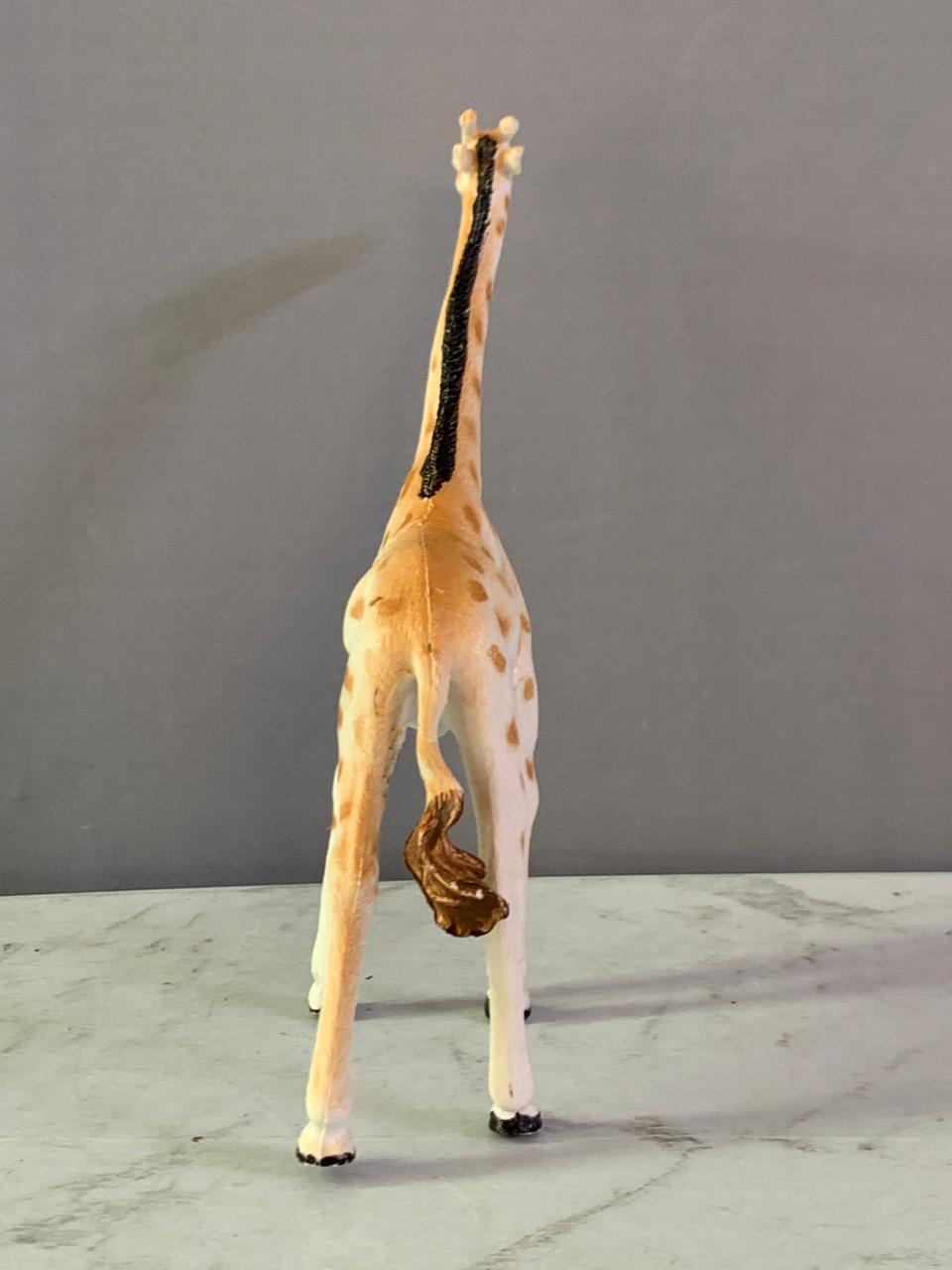 Giraffe Toy Figurine. (Rs 100)