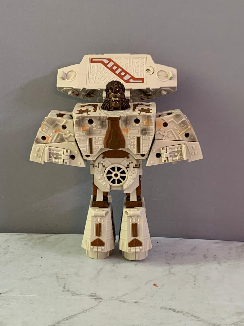 Star Wars Transformers Han Solo & Chewbacca Millennium Falcon Figure. (Rs 350 advance)