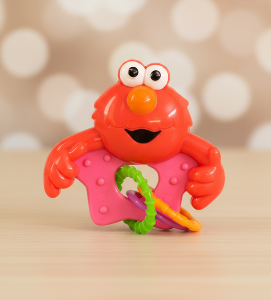 Sesame Street Elmo Rattle with Rings. (Rs 100 advance)