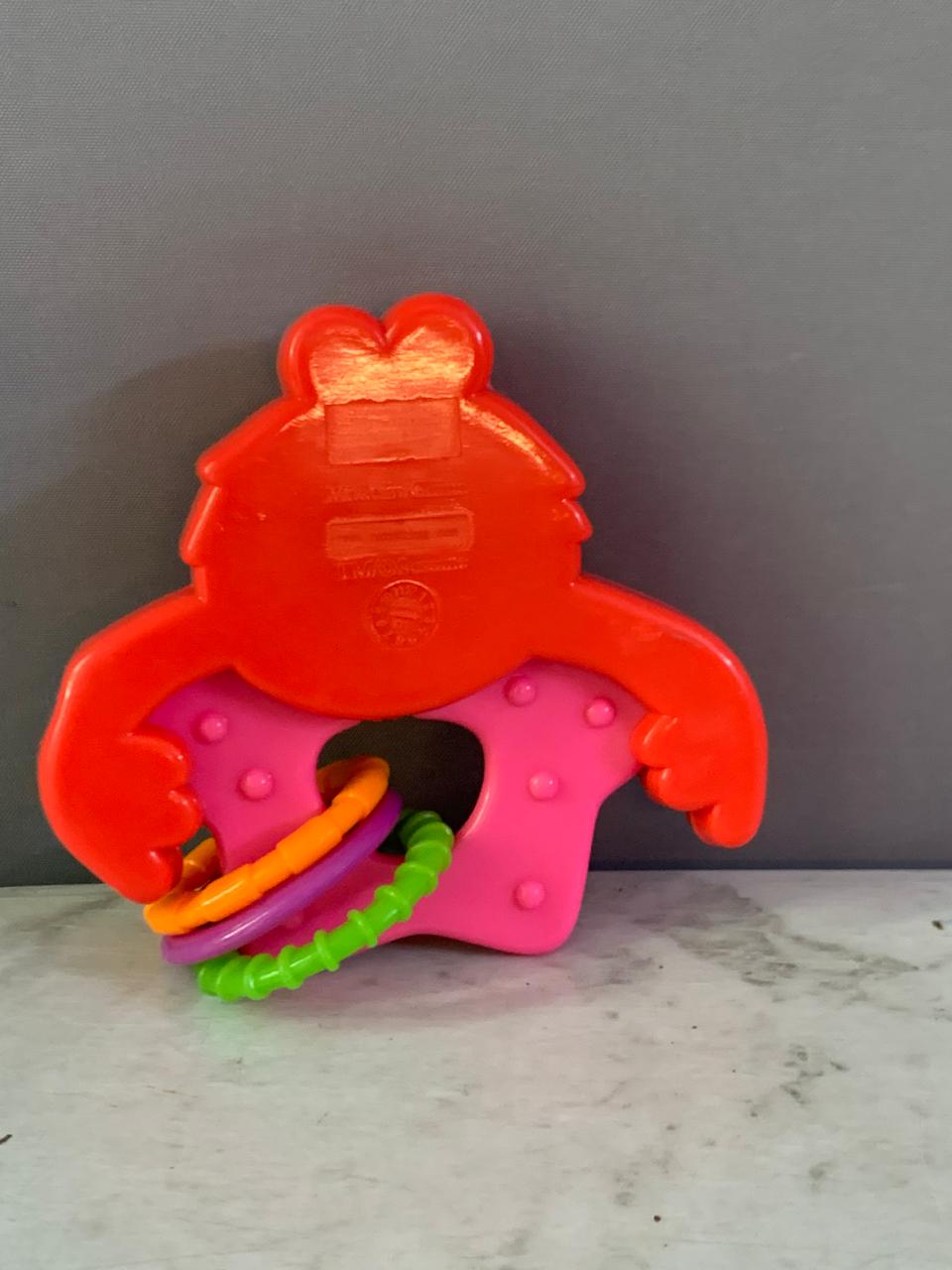 Sesame Street Elmo Rattle with Rings. (Rs 100 advance)