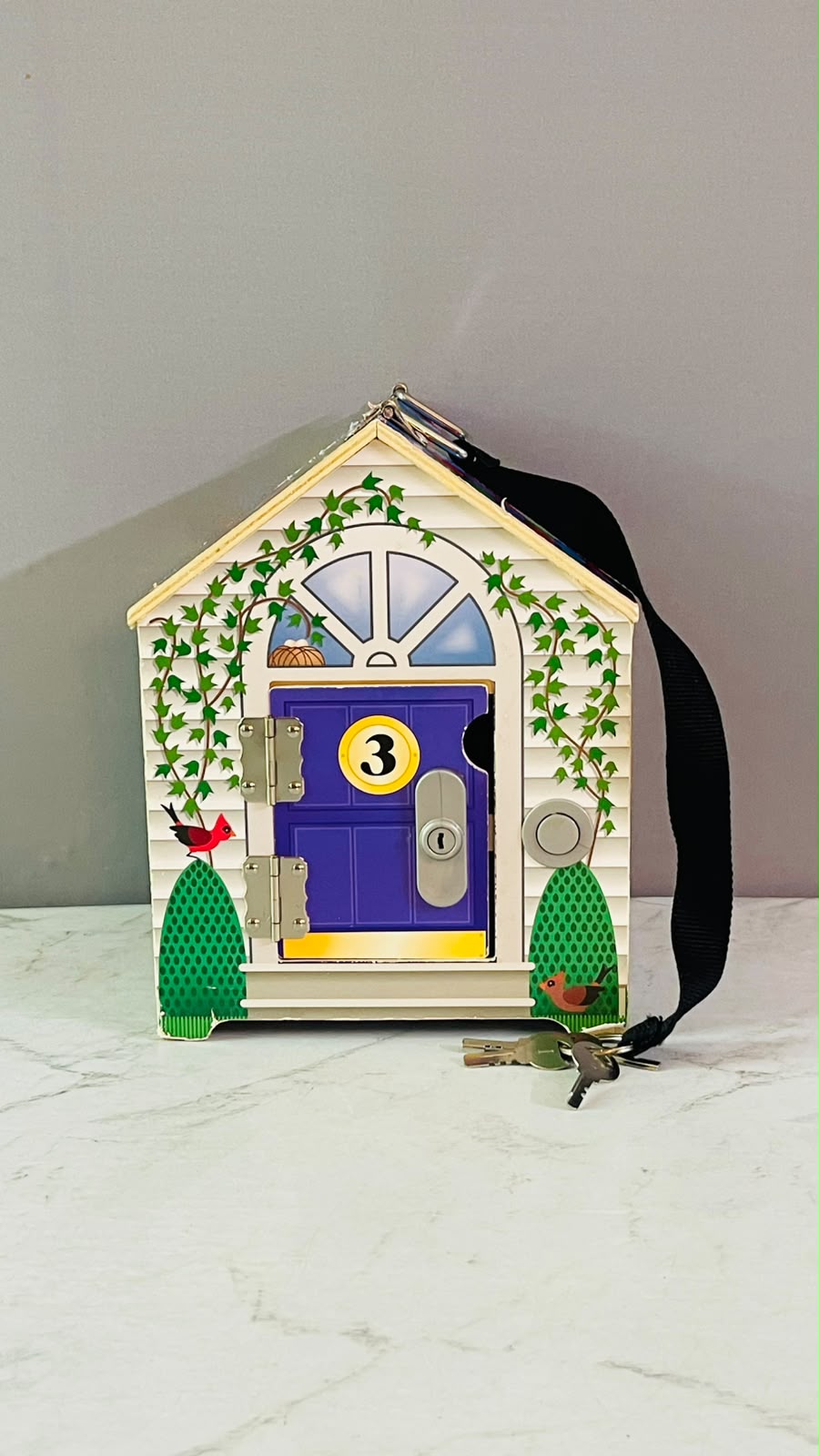 Melissa & Doug Take-Along Wooden Doorbell Dollhouse. (Rs 400 advance)