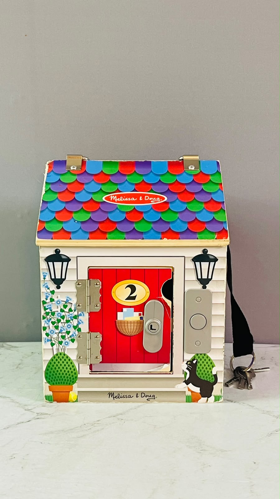 Melissa & Doug Take-Along Wooden Doorbell Dollhouse. (Rs 400 advance)