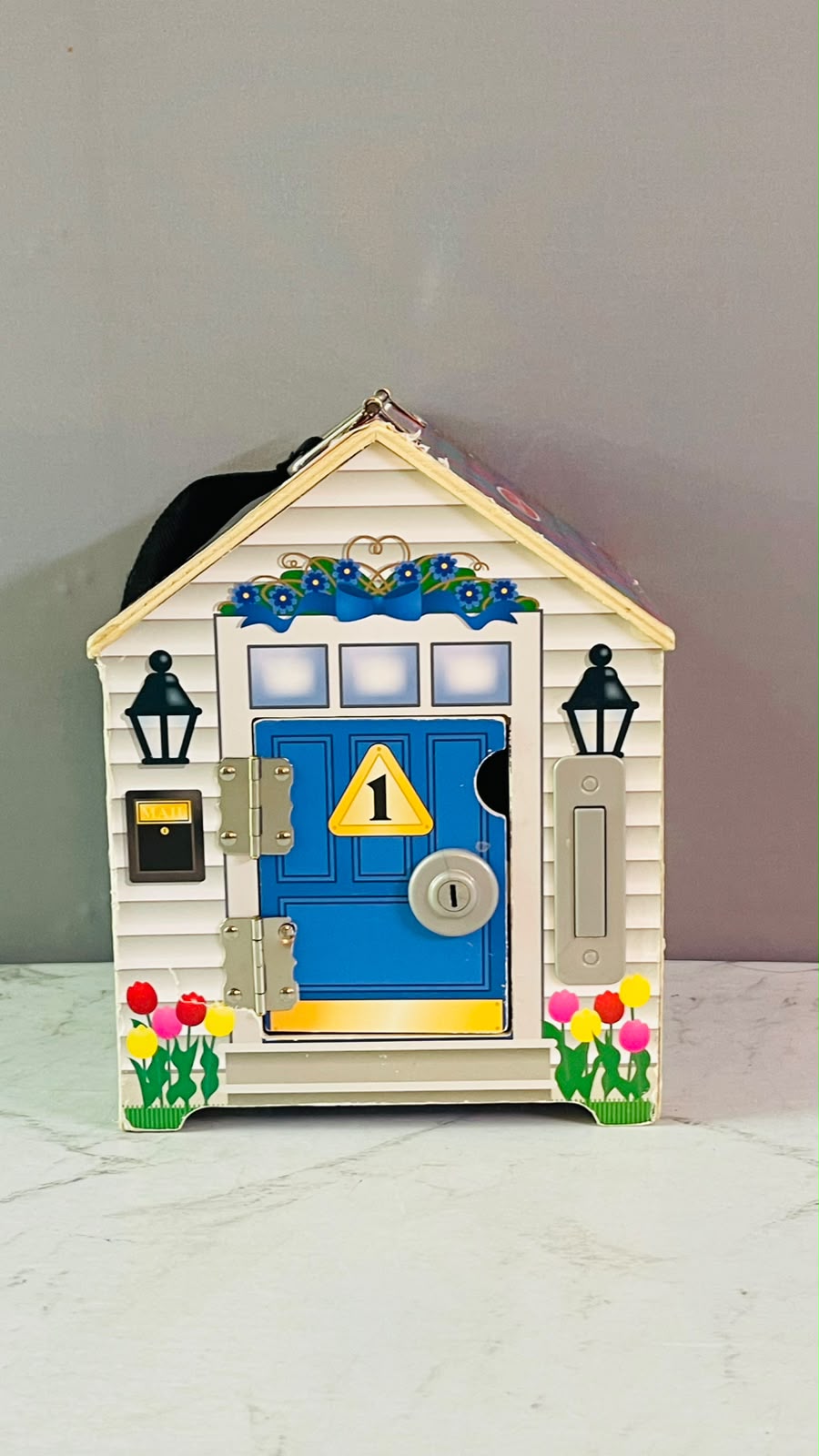 Melissa & Doug Take-Along Wooden Doorbell Dollhouse. (Rs 400 advance)