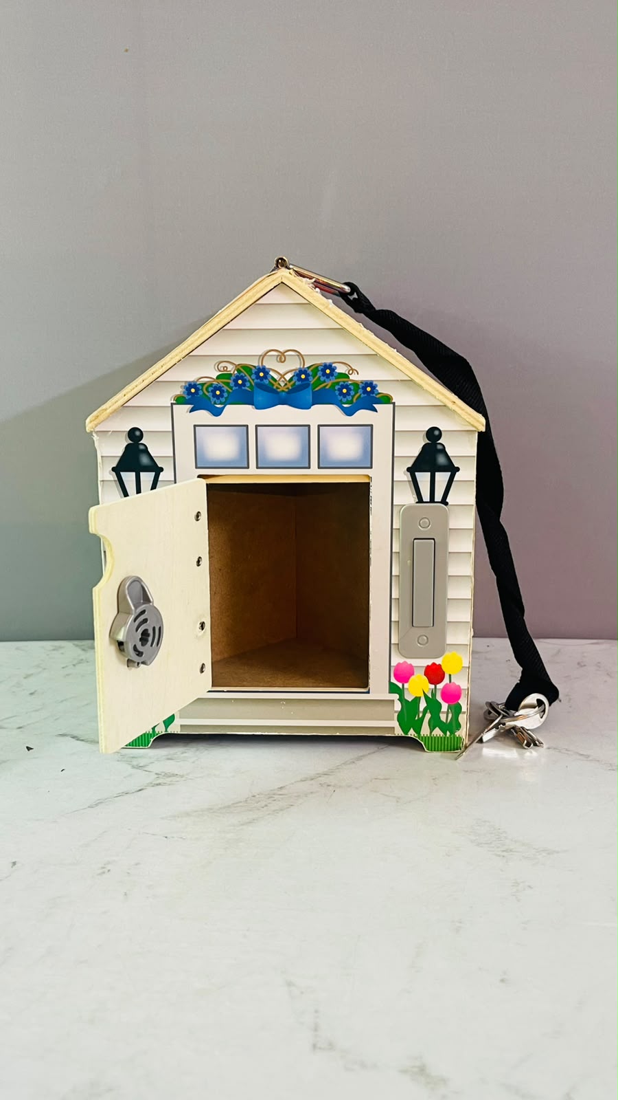Melissa & Doug Take-Along Wooden Doorbell Dollhouse. (Rs 400 advance)