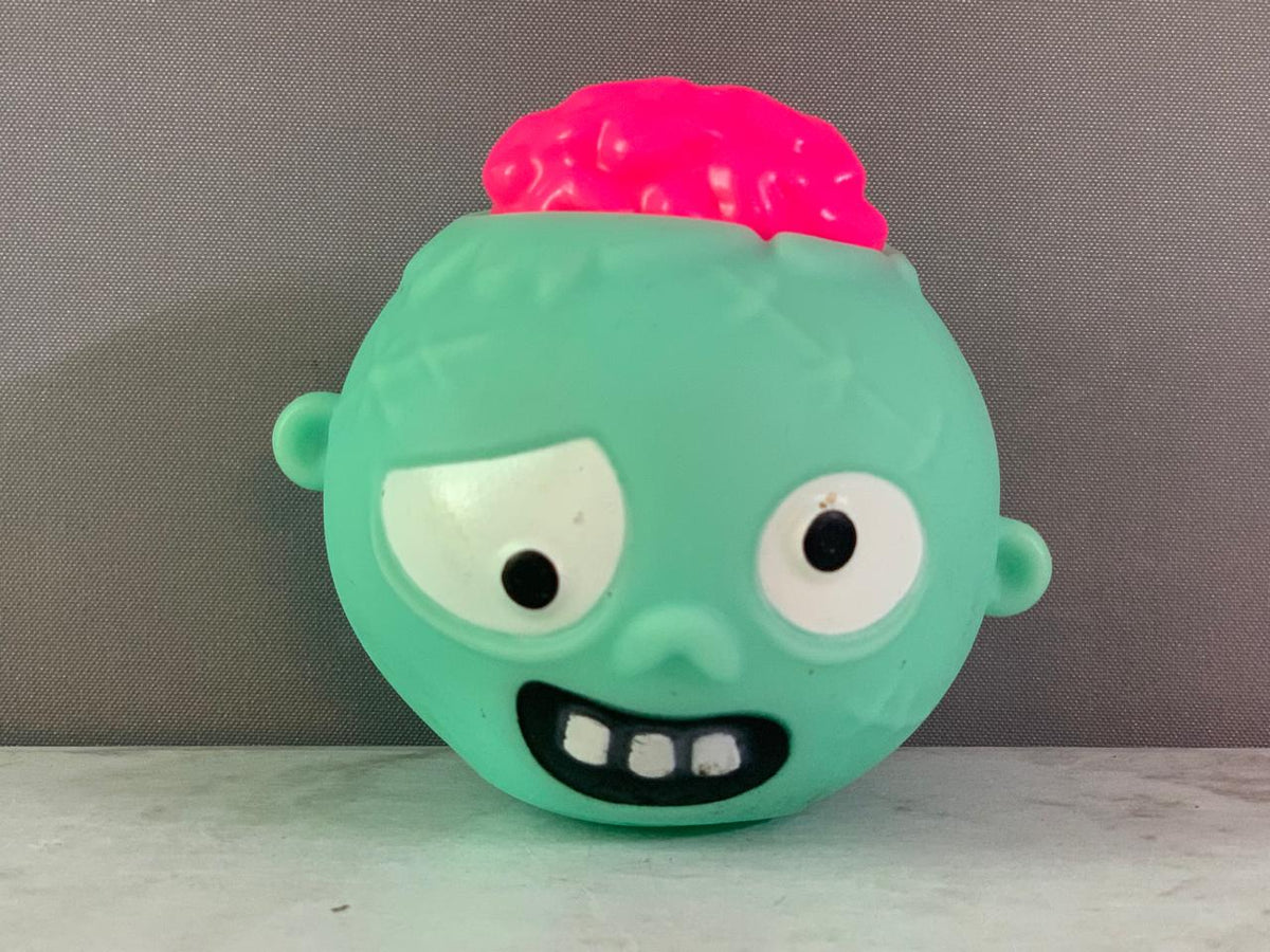Zombie Squeeze Head Bopper Novelty Toy.