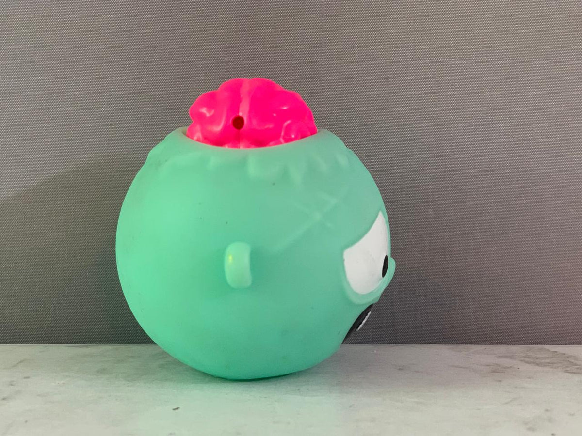 Zombie Squeeze Head Bopper Novelty Toy.