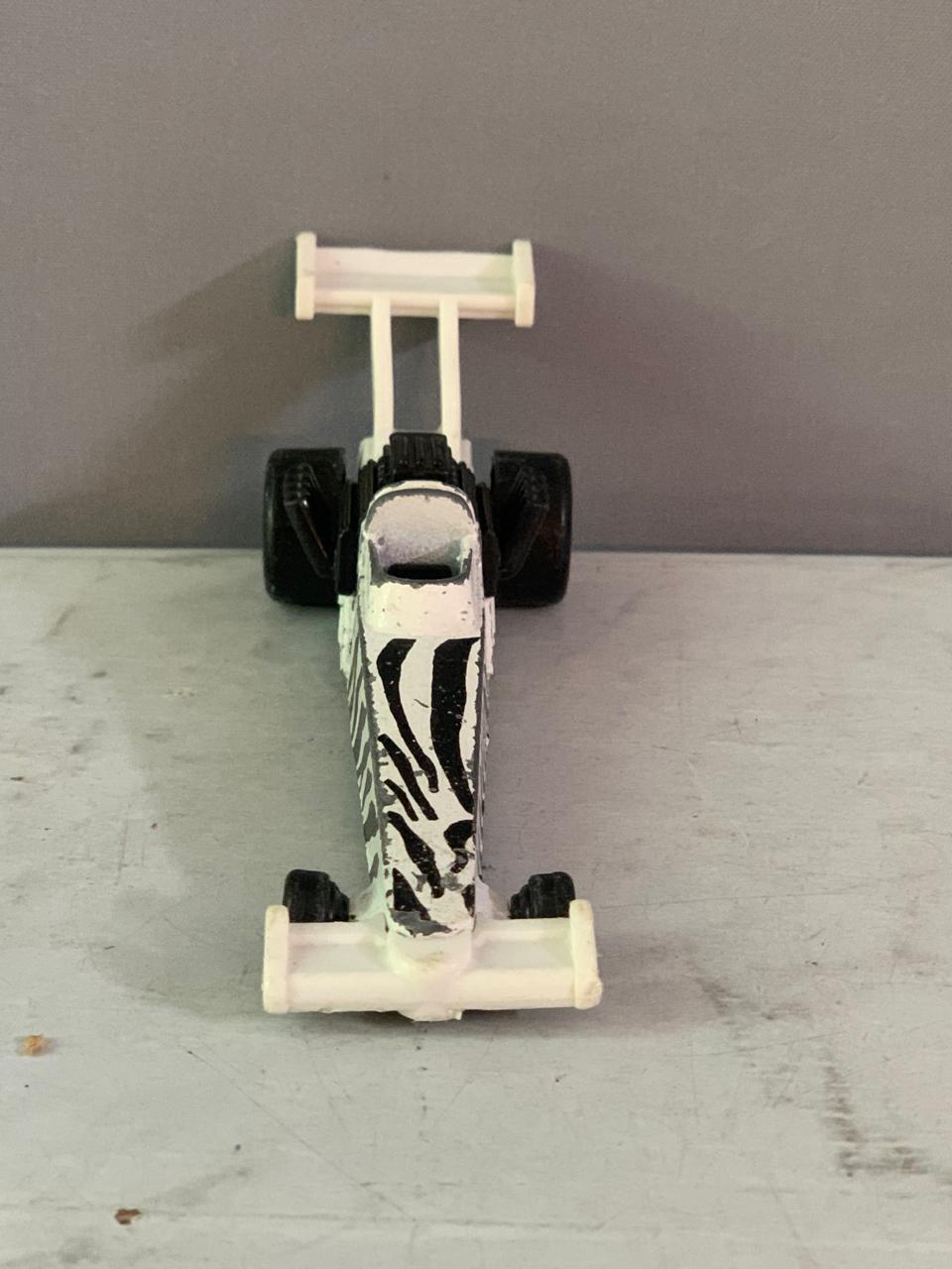 Hot Wheels Zebra Dragster Toy Car (Rs 150 advance)