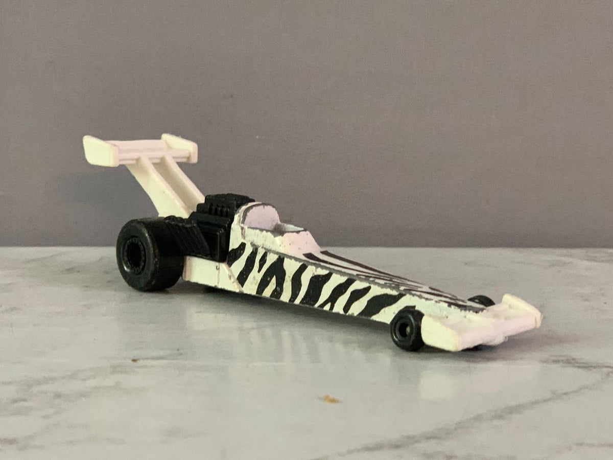 Hot Wheels Zebra Dragster Toy Car (Rs 150 advance)