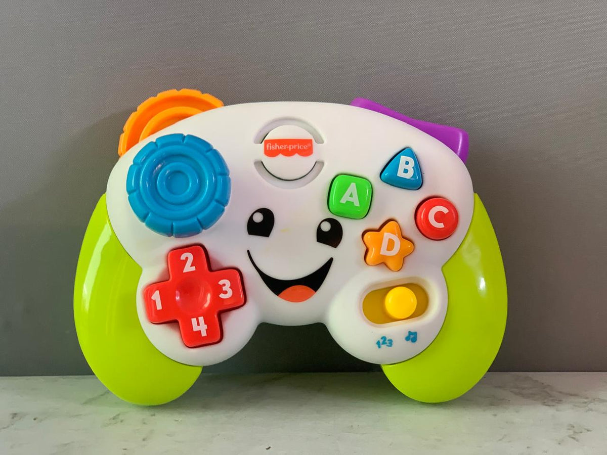 Fisher-Price Baby & Toddler Toy Laugh & Learn Game Controller.