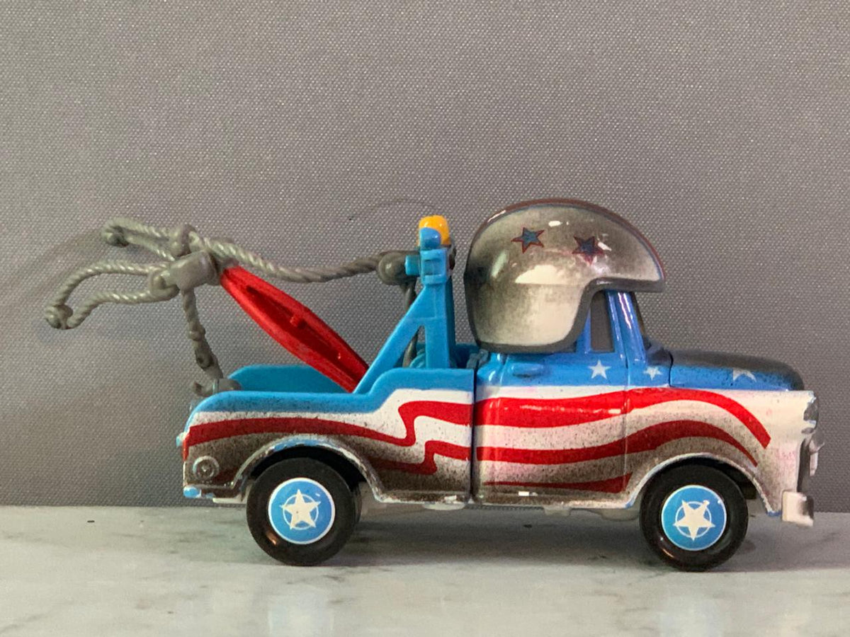 Disney Pixar Cars Toon Deluxe Cannonball Mater Stunt. (Rs 200 advance)