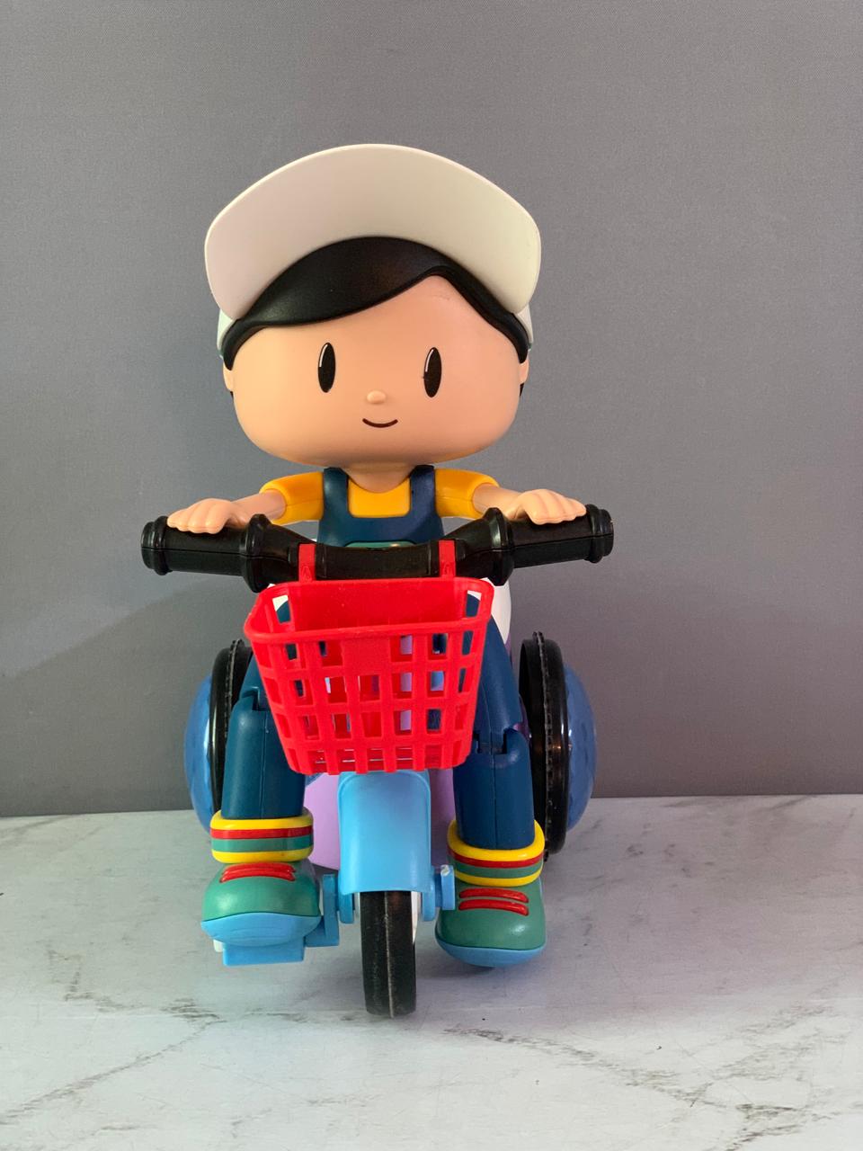 Popsugar Musical Bump and Go Stunt Tricycle. (Foot detached, must check video)(Rs 350 advance)