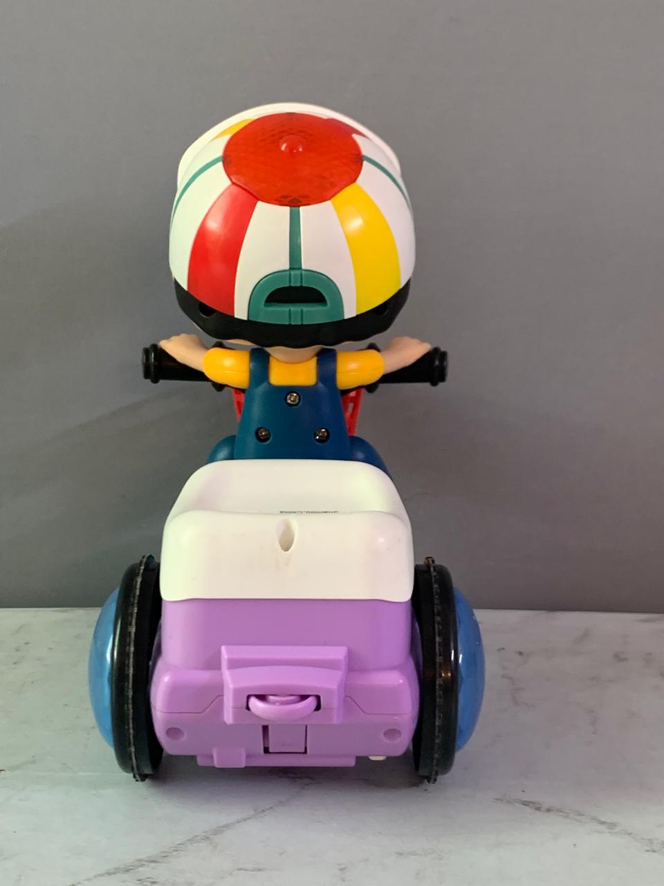 Popsugar Musical Bump and Go Stunt Tricycle. (Foot detached, must check video)(Rs 350 advance)