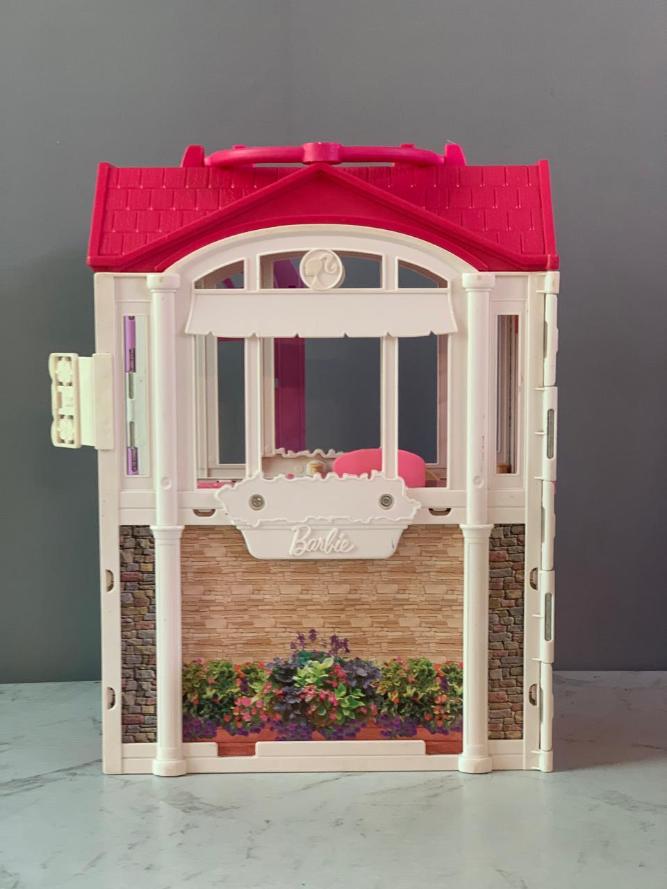 Barbie Glam Getaway Portable Dollhouse. (Rs 500 advance)