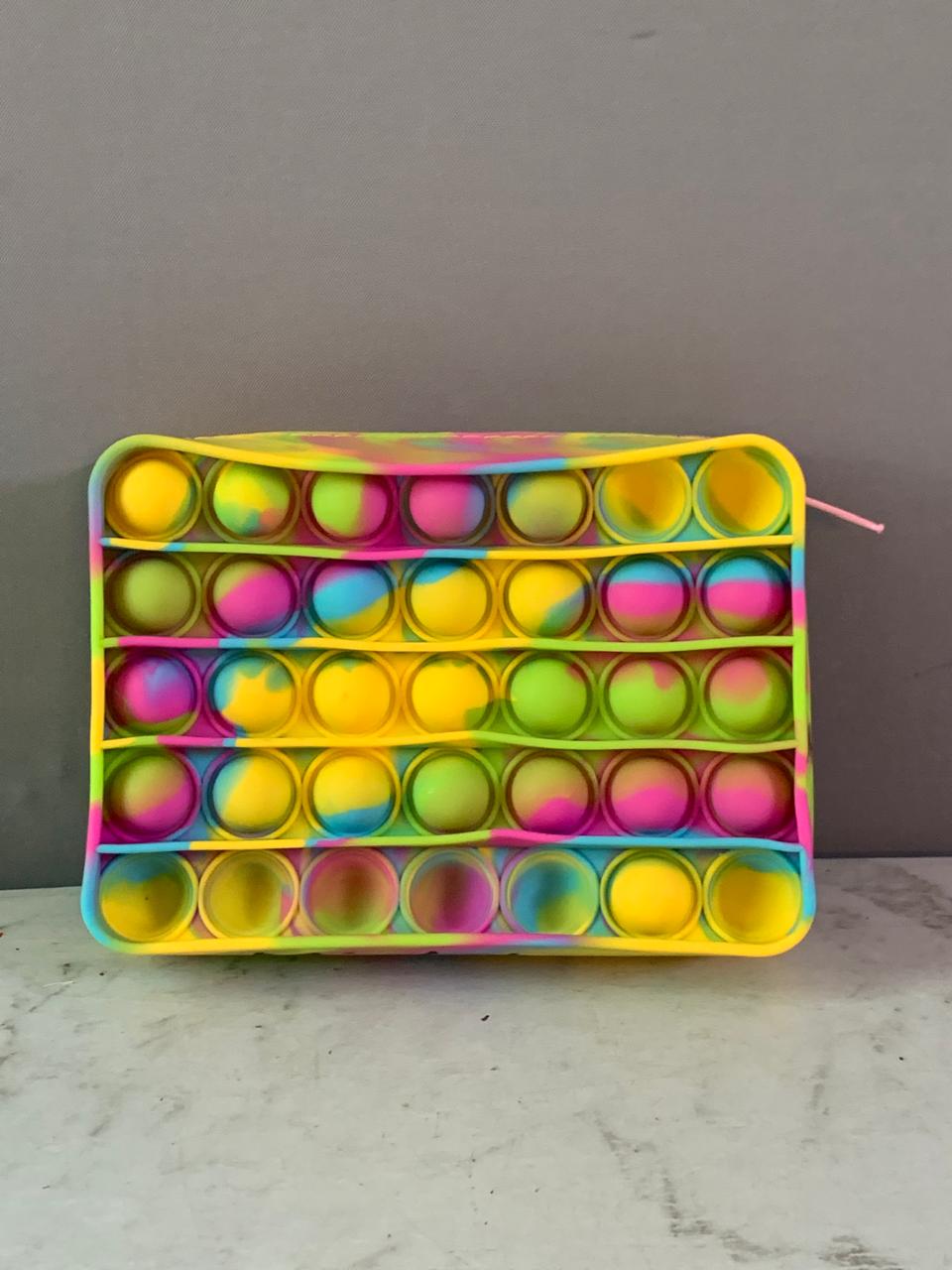Rainbow Silicone Pop-It Pouch. (Must check video) (Rs 150 advance)