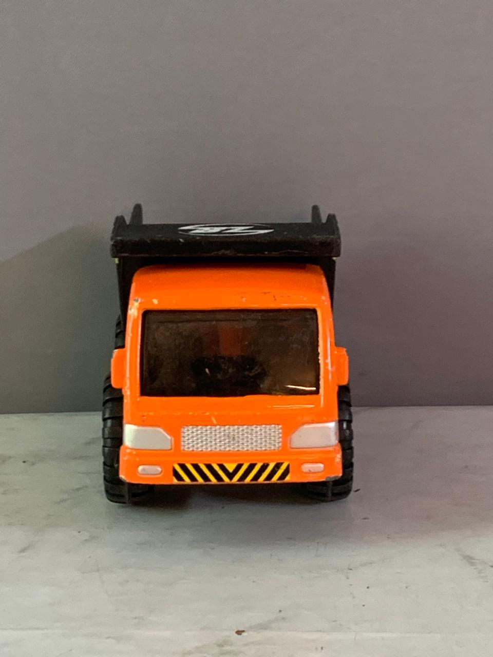 Maisto Fresh Metal Builder Zone Orange Dump Truck. (Rs 100 advance)