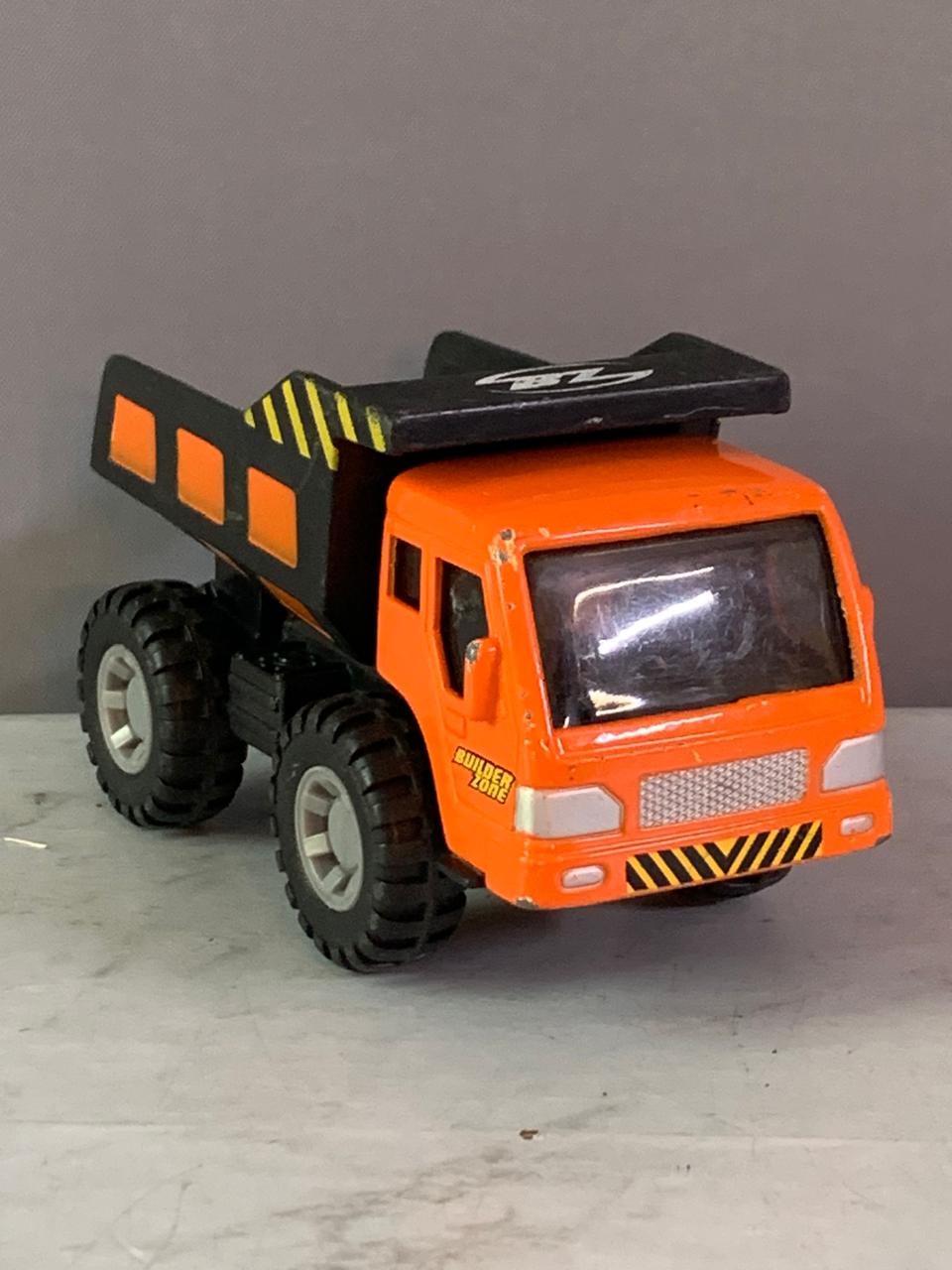 Maisto Fresh Metal Builder Zone Orange Dump Truck. (Rs 100 advance)