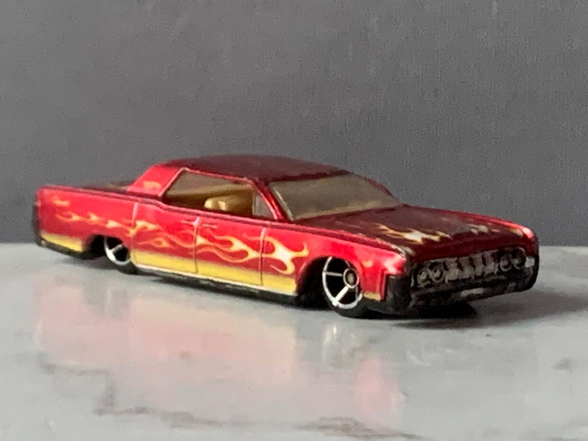 Hot Wheels '64 Lincoln Continental Toy Car.
