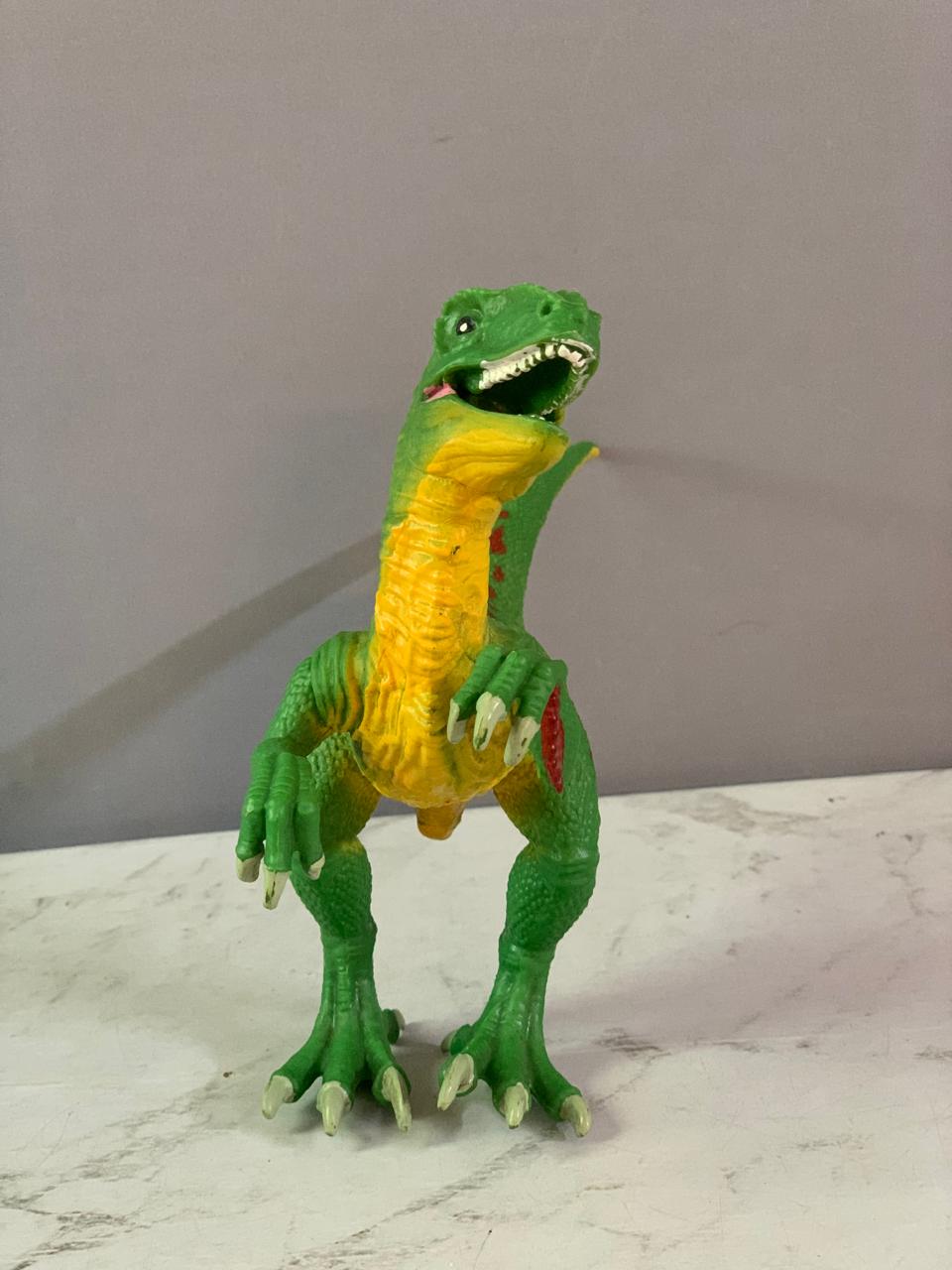Schleich Green Velociraptor Dinosaur Figure. (Rs 200 advance)